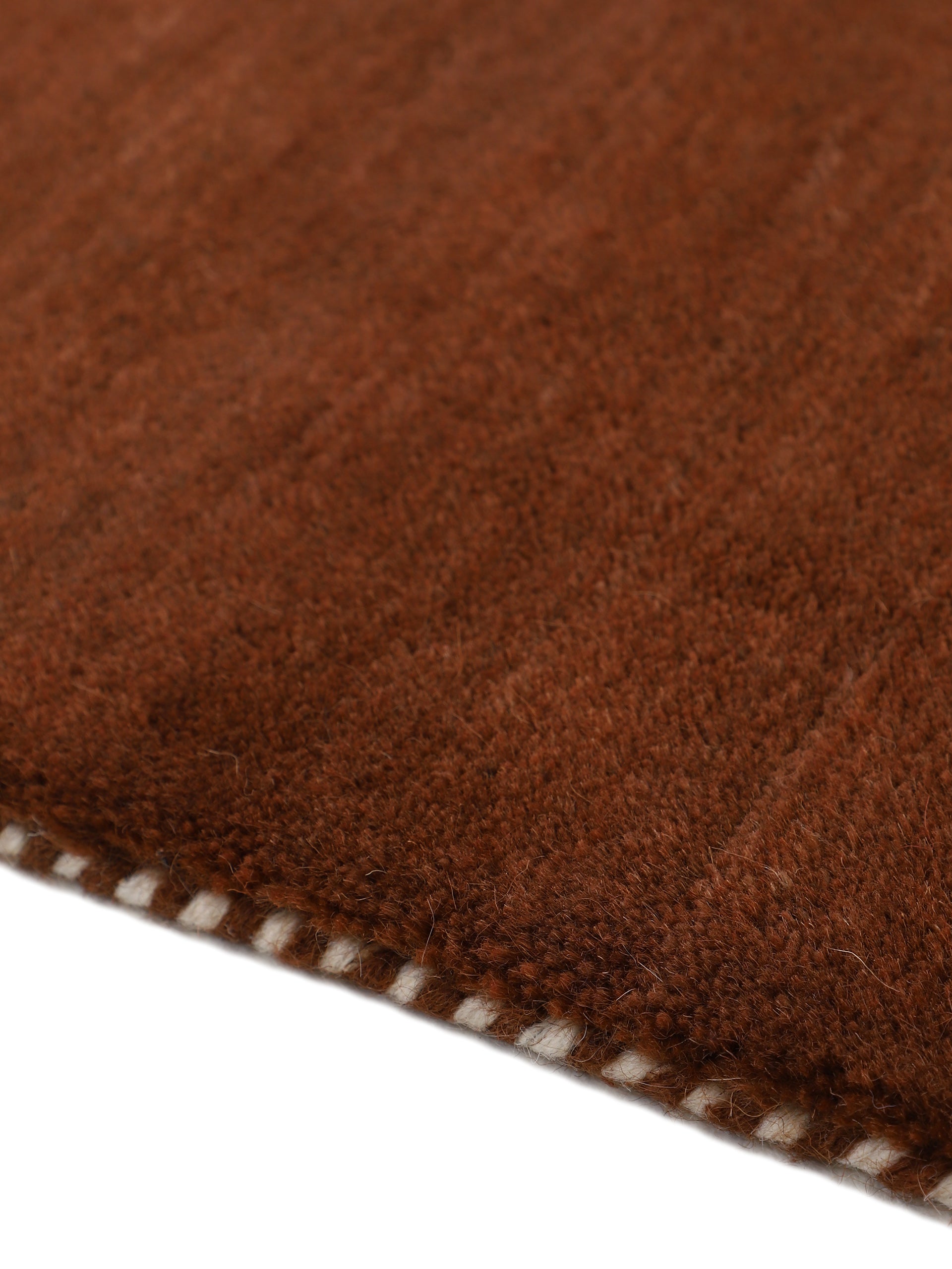 Wollteppich Gabbeh Uni Rund Braun in braun aus wolle