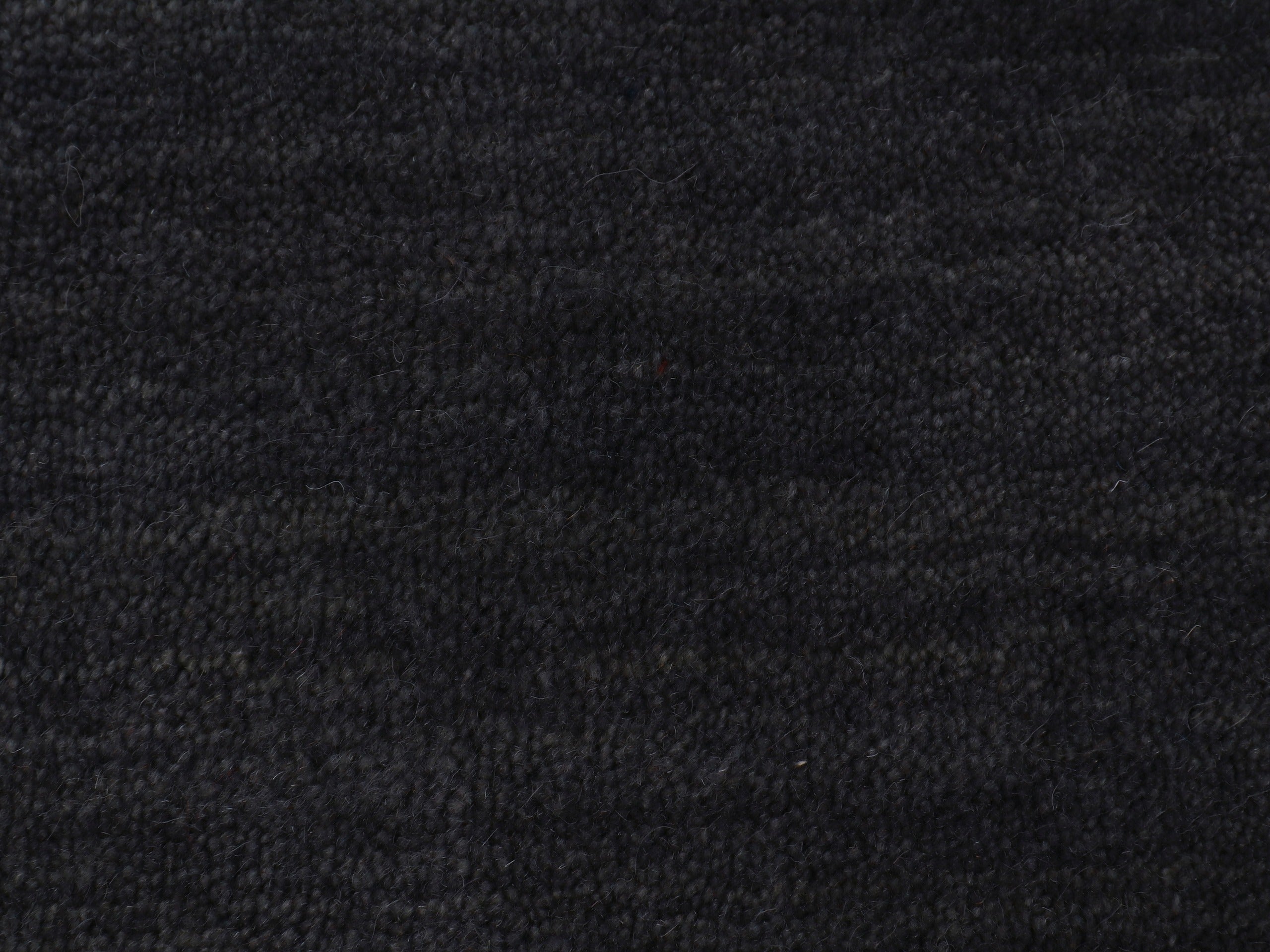 Wollteppich Gabbeh Uni Rund Grau in grau aus wolle